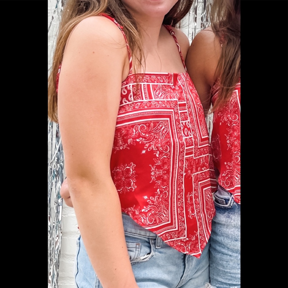 A red bandanna top ! :) adjustable straps can fit like a xs - small! :)